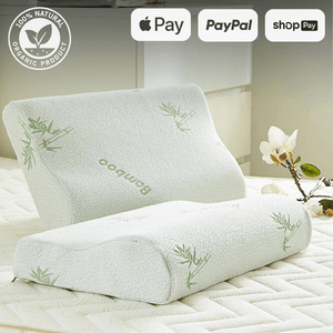 Organic bamboo pillows on a bed with natural floral designs, showcasing "100% Natural Organic Product" badge and payment options including Apple Pay, PayPal, and Shop Pay.
