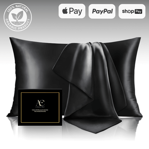 Luxurious black silk pillowcases displayed with a matching silk bedding set, highlighting their smooth texture, elegance, and skin-friendly benefits.