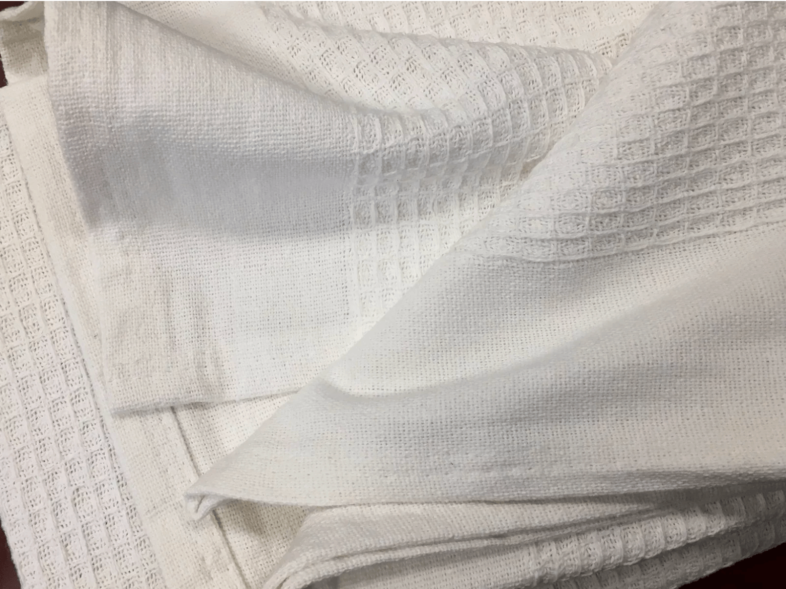 White cotton waffle blanket with a soft texture - Lightweight and breathable waffle blankets for all-season comfort.