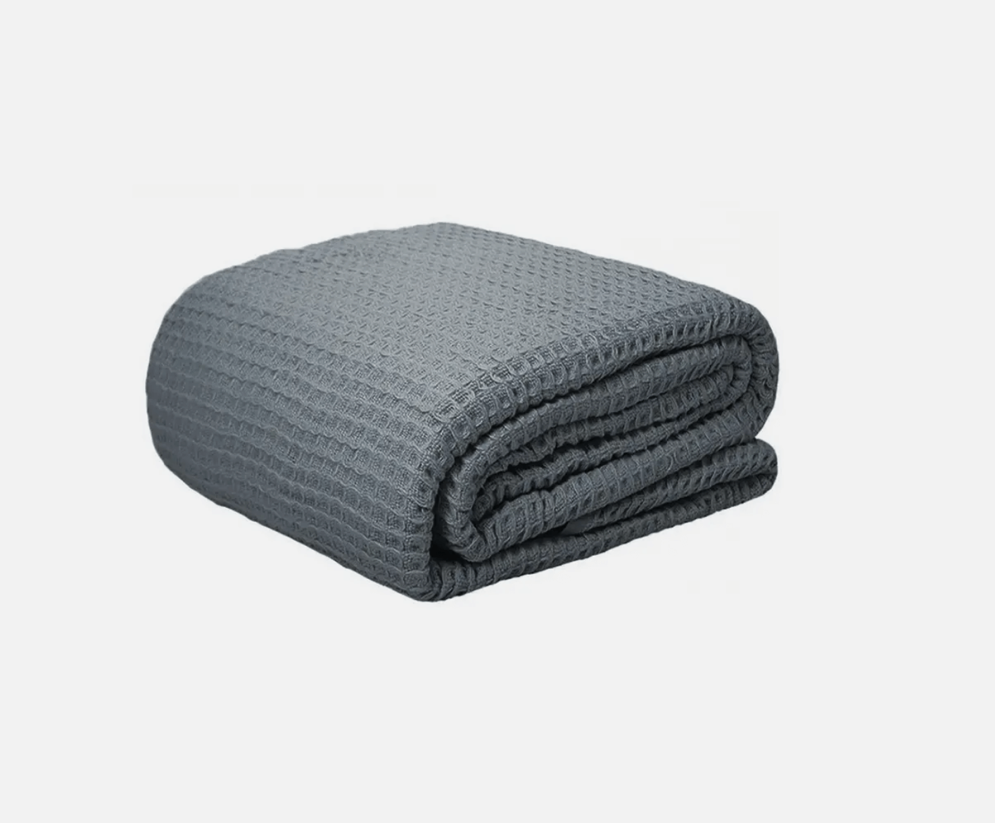 Dark grey cotton waffle blanket neatly folded - Stylish and breathable waffle blankets for warmth and comfort