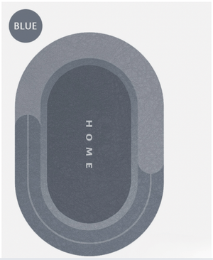 Oval-shaped dark grey bath mat with non-slip base and soft texture