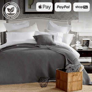 Luxurious bedroom with organic bedding and multiple payment options Apple Pay, PayPal, and Shop Pay.