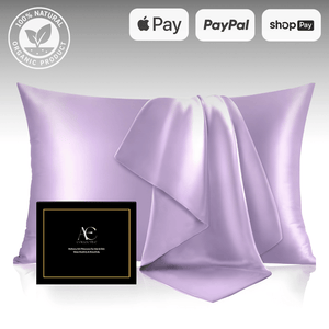 Elegant lavender silk pillowcase set with a matching silk cloth, accompanied by a black gift box, highlighting its luxurious and smooth texture.