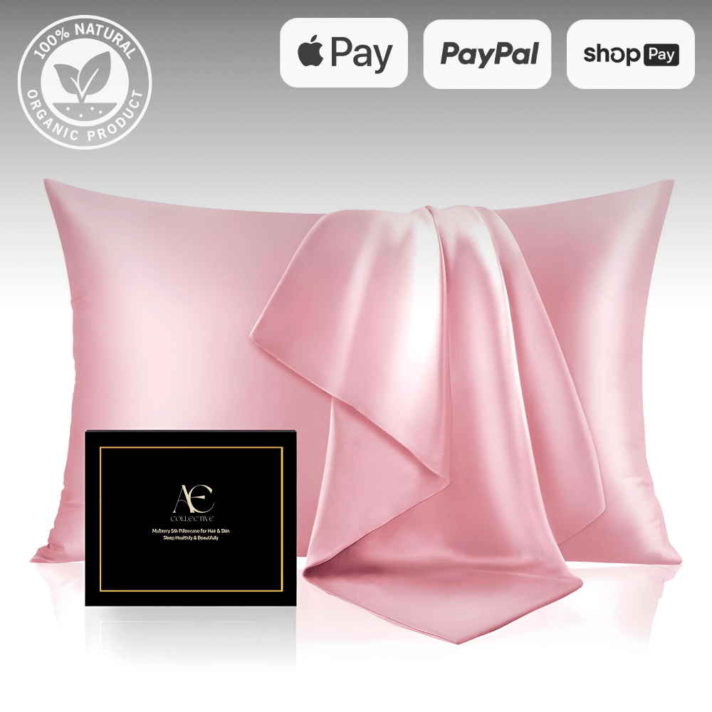 Elegant pink silk pillowcase set with a matching silk cloth, accompanied by a black gift box, highlighting its luxurious and smooth texture