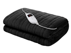 Black electric heated blanket with control remote placed on top