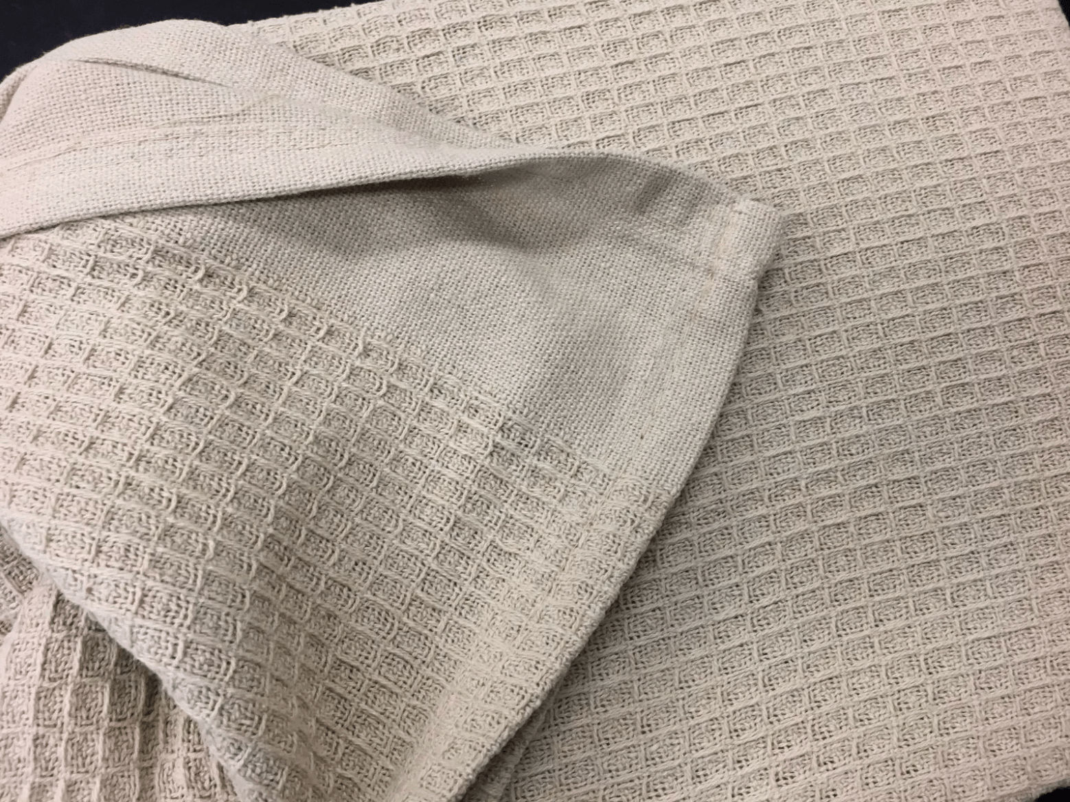 Close-up of a soft cotton waffle blanket - Cozy and breathable waffle blankets for warmth and comfort.