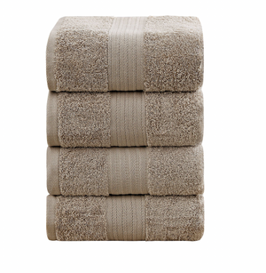beige towels stacked set bathroom essentials